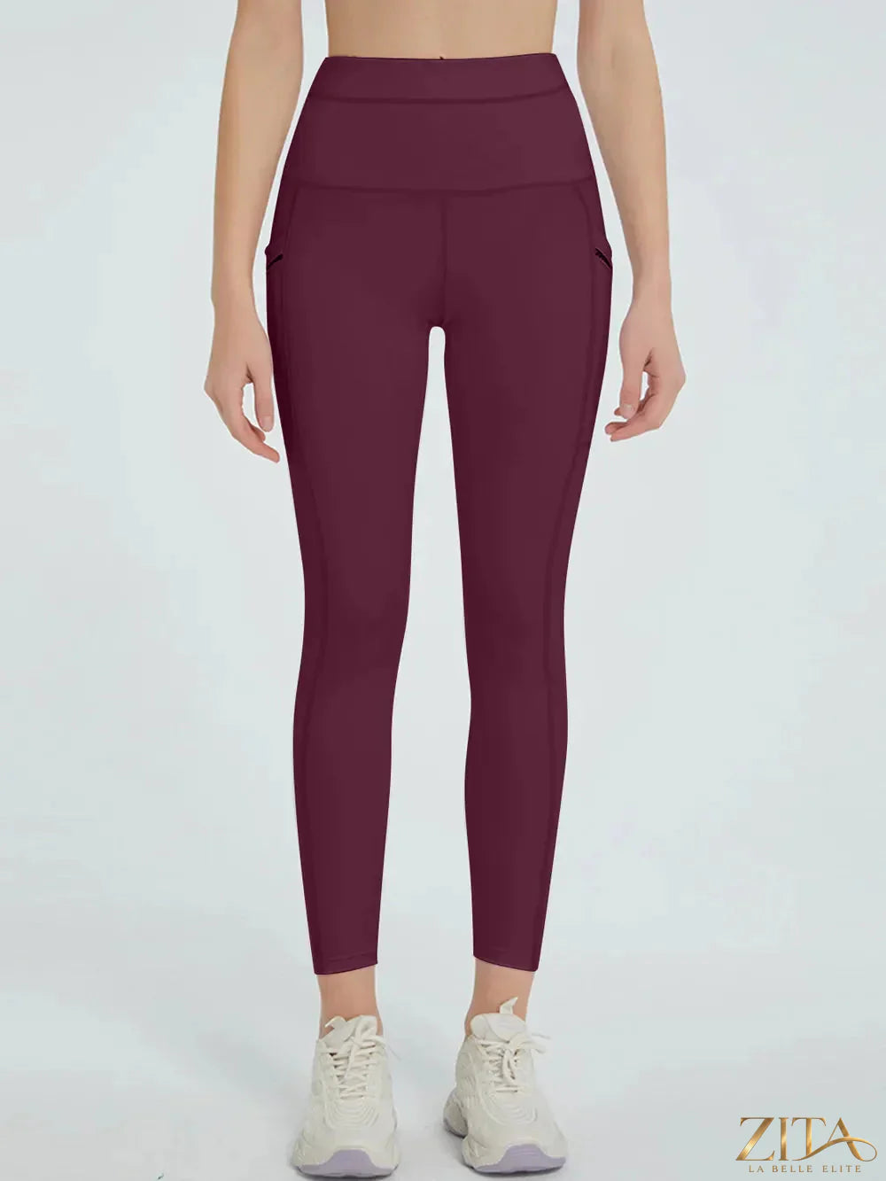 High waist active leggings by Trendsi with a sleek, stretch-fit design, shown on a model for comfortable workout wear.