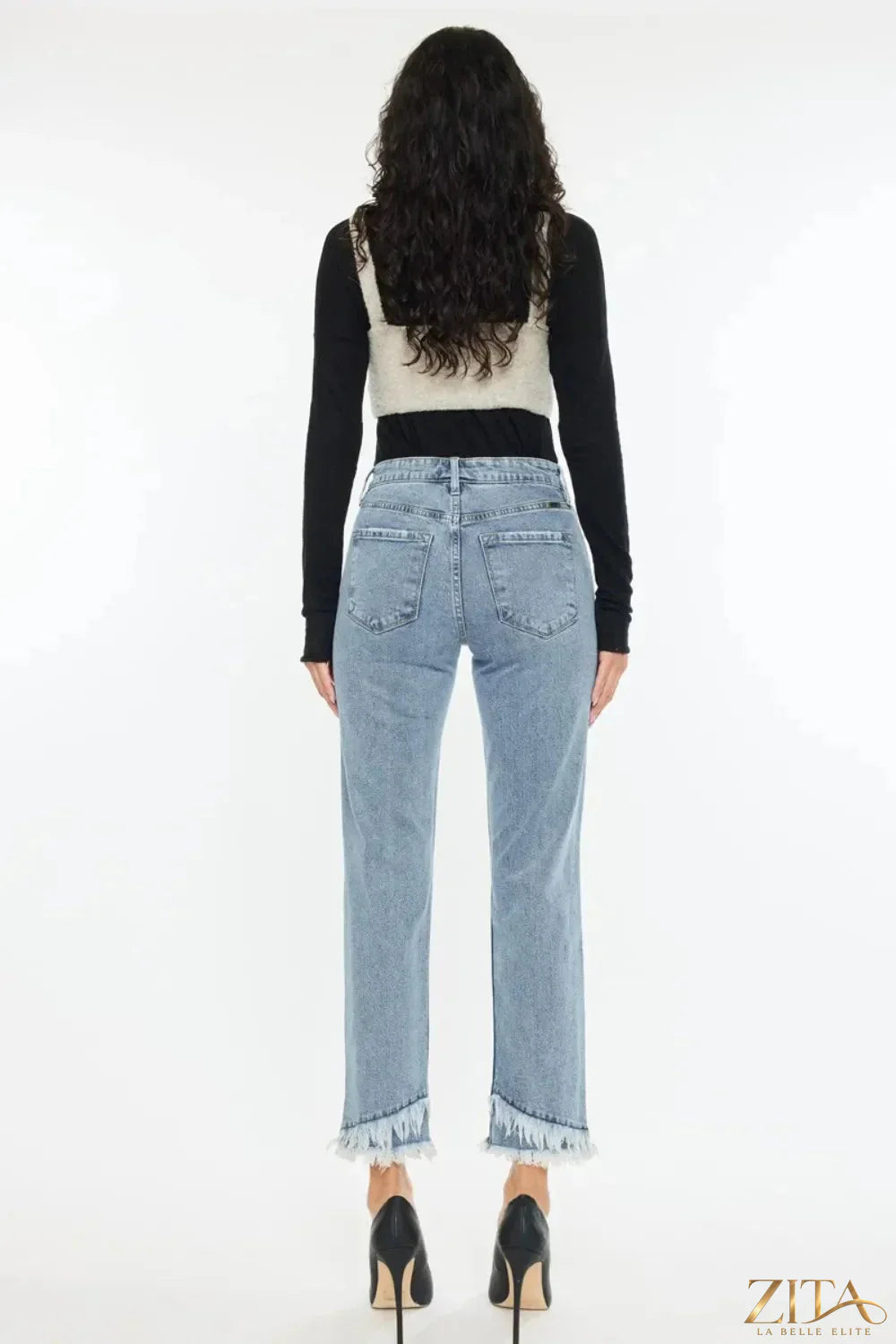Zita La Belle Elite Kancan raw hem high rise straight jeans displayed on a model, showcasing denim's fit and raw hem detail.