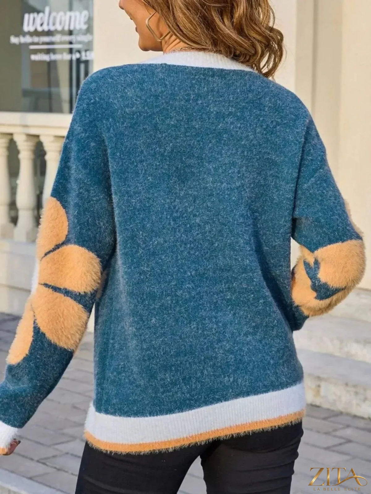 Zita La Belle Elite flower round neck sweater featuring a floral pattern and ribbed cuffs, in soft knit fabric.