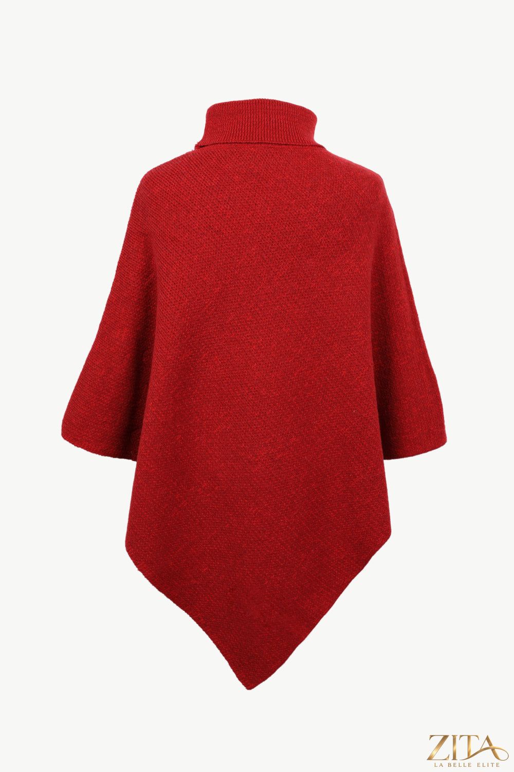 Zita La Belle Elite tan turtleneck buttoned poncho with ribbed collar and relaxed fit, displayed on a neutral background.
