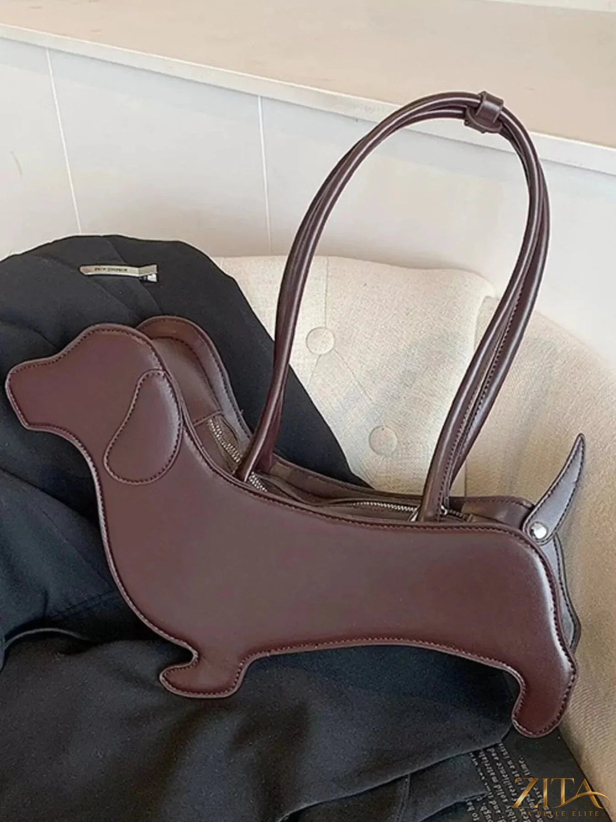 Zita La Belle Elite dachshund-shaped shoulder bag with detailed features and a playful, realistic dog design.