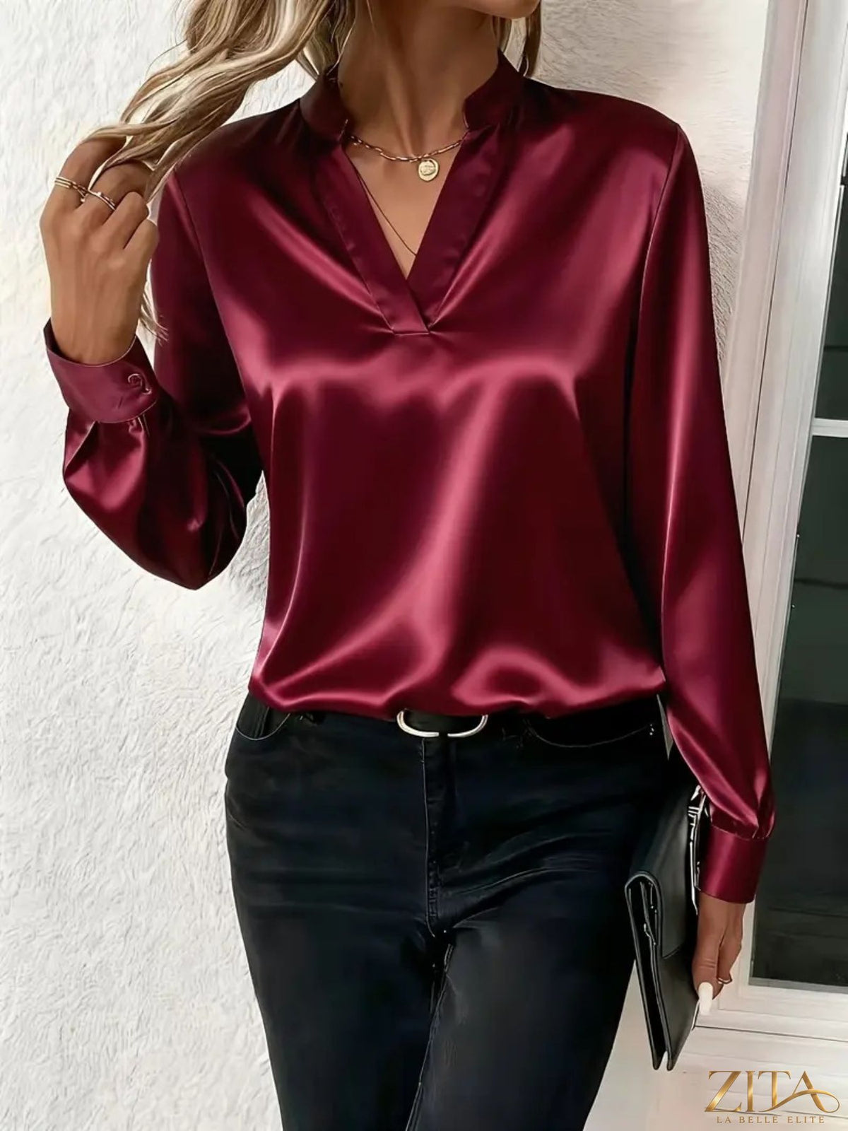 Zita La Belle Elite satin notched long sleeve blouse with a smooth, shiny fabric and elegant collar detail.
