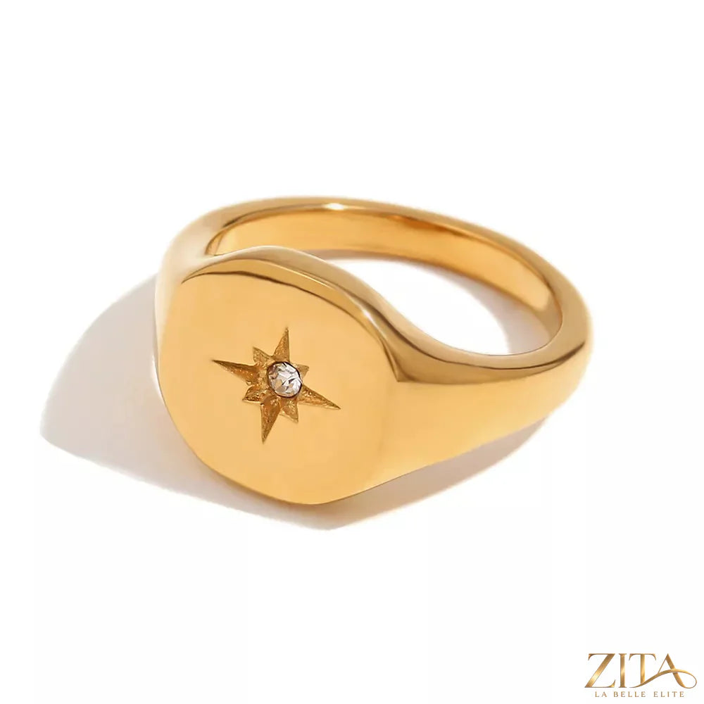 Minimalist North Star signet ring by Zita La Belle Elite featuring a sleek design and star engraving on polished metal.