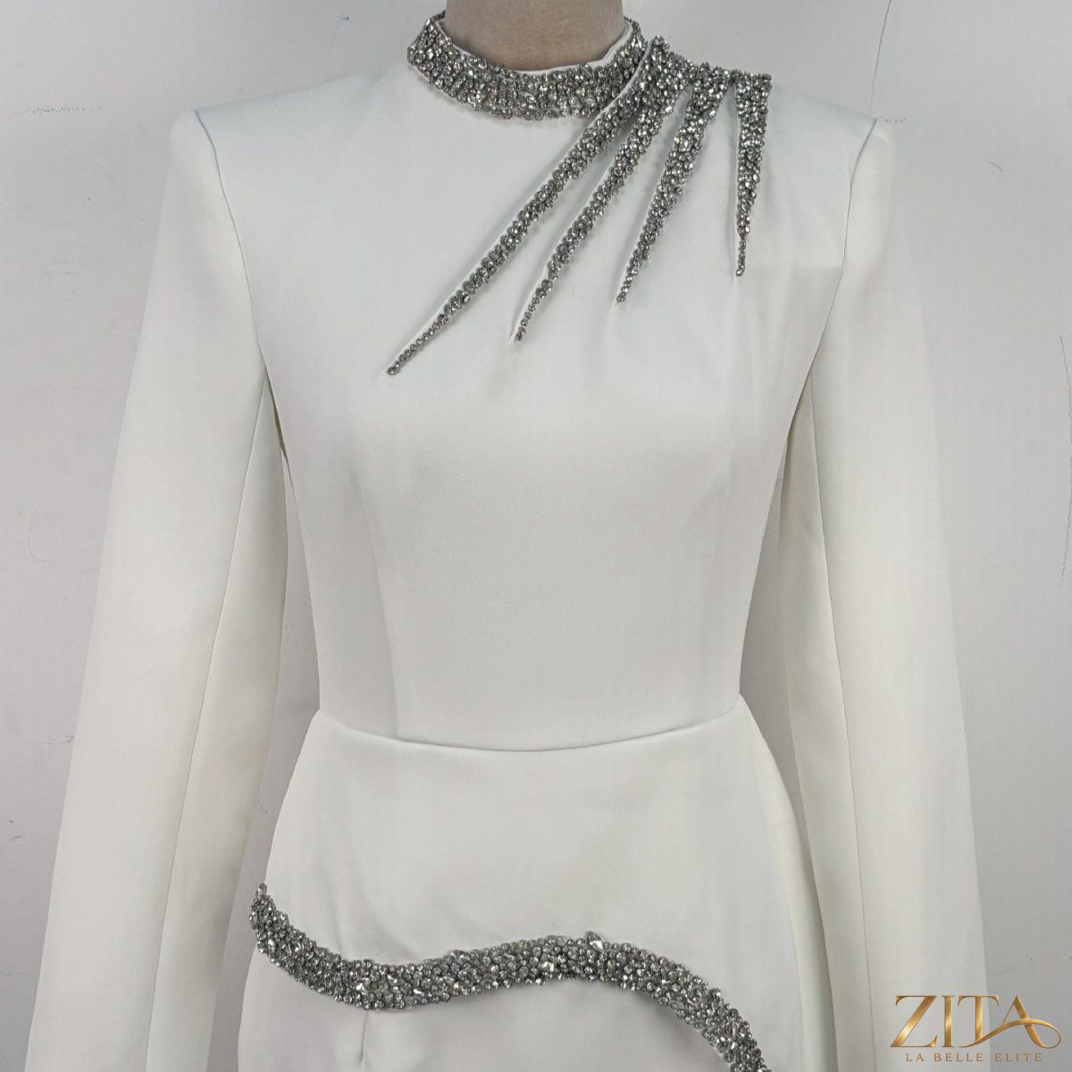 Crystal-embellished Zita La Belle Elite evening gown with intricate beadwork and flowing fabric, perfect for formal occasions.