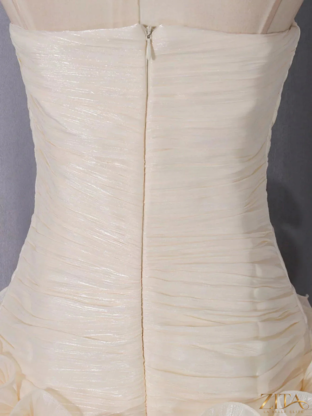 Strapless ruffle ruched mini dress from Trendsi featuring a fitted bodice and playful ruffle details for a chic look.