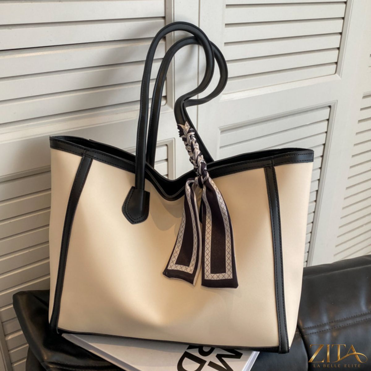 Contrast tote bag by Zita La Belle Elite featuring a stylish black and white design with sturdy handles and spacious interior.