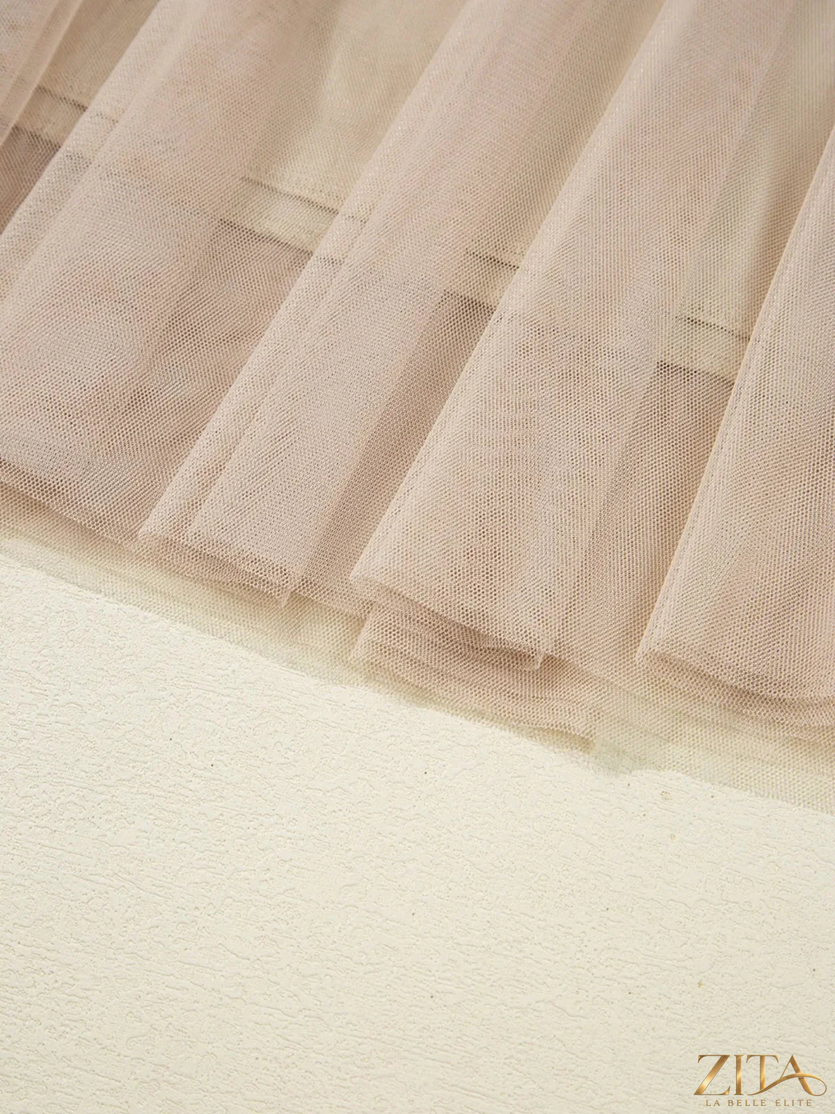 High-waisted midi skirt from Trendsi, showcasing a flowy fabric and elegant design in a stylish neutral color.