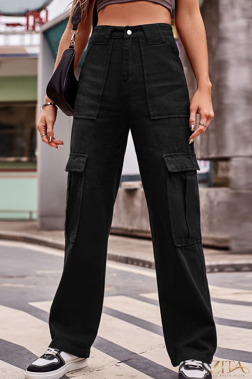 Zita La Belle Elite buttoned high waist loose fit jeans with front pockets and relaxed style, shown on a model.