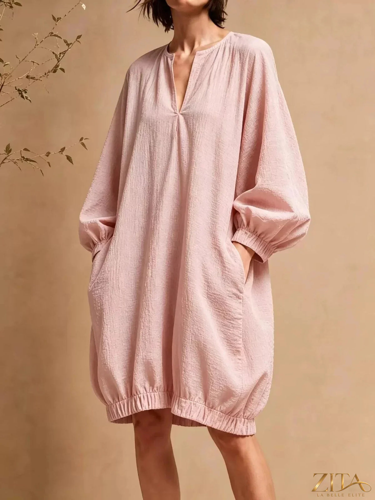 Zita La Belle Elite casual loose-fit mini dress with balloon sleeves and pockets, styled for a relaxed, trendy look.