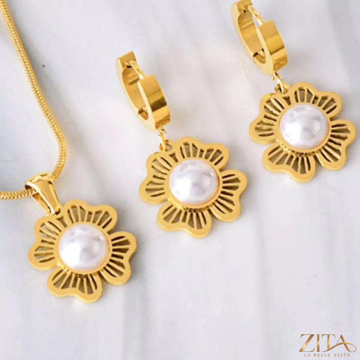 18K gold-plated flower jewelry set with matching necklace and earrings, featuring intricate floral design and sparkling accents.