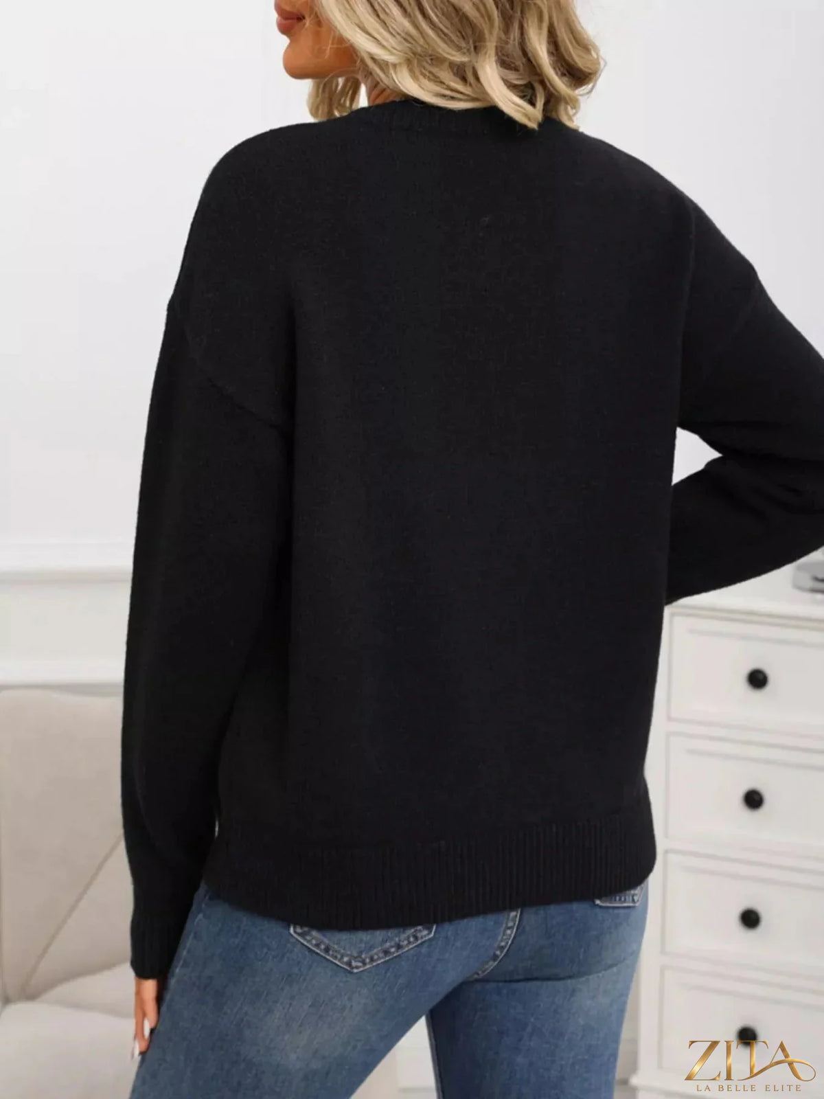 Cherry-colored round neck sweater by Trendsi, showing a close-up of the soft fabric and classic fit.