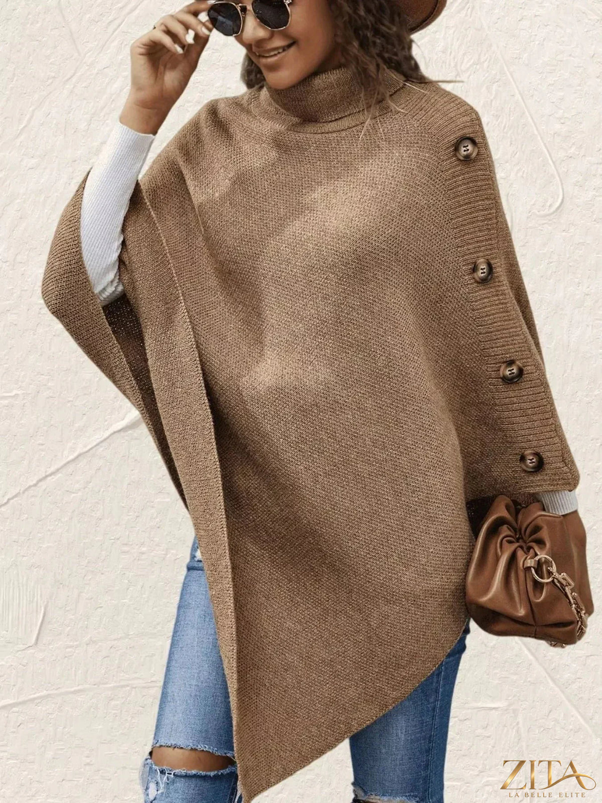 Zita La Belle Elite button-decor turtleneck poncho pullover in cozy knit fabric, featuring large buttons and a relaxed fit.
