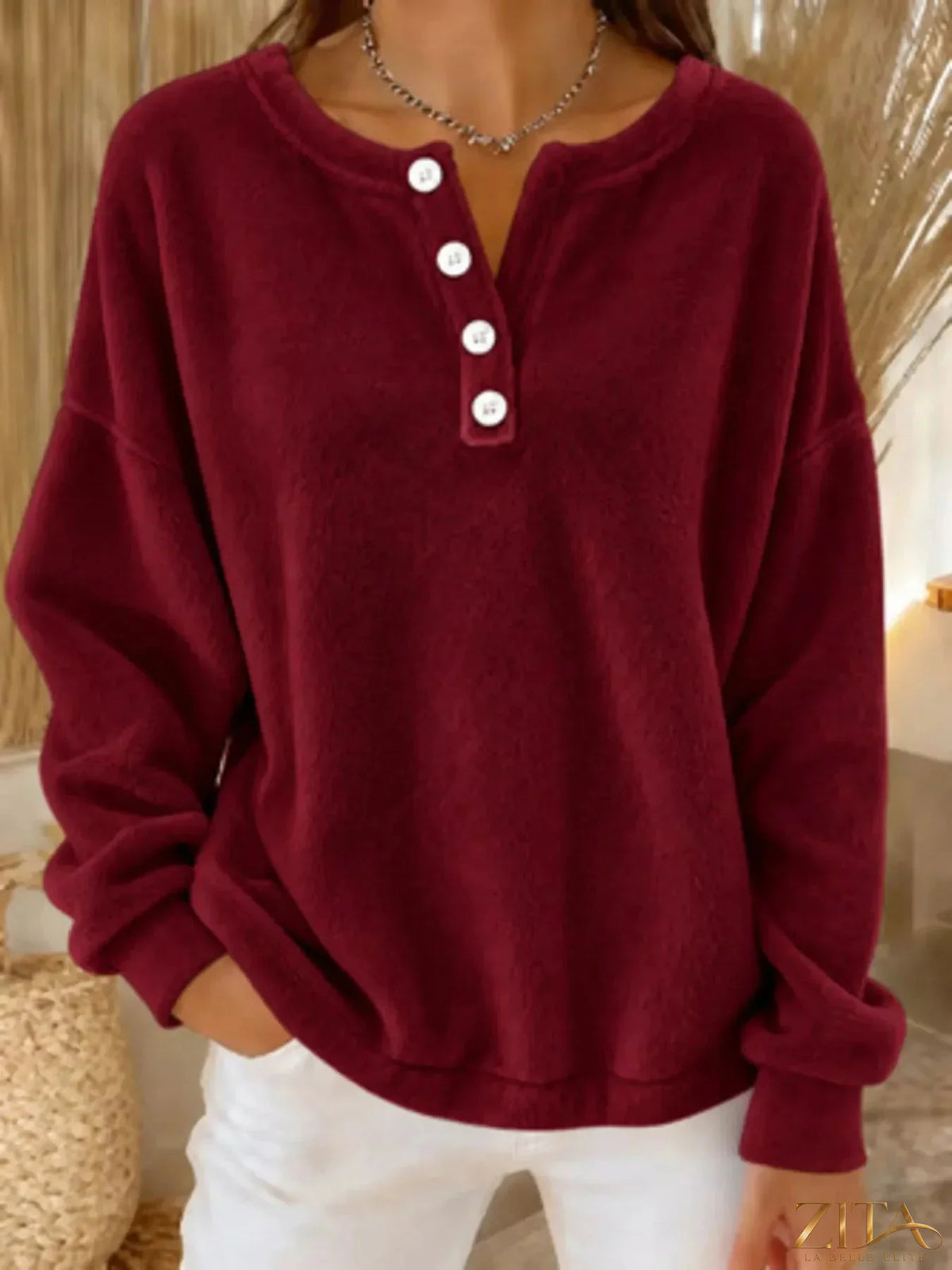 Zita La Belle Elite button detail dropped shoulder sweatshirt in soft fabric with relaxed fit and casual style.
