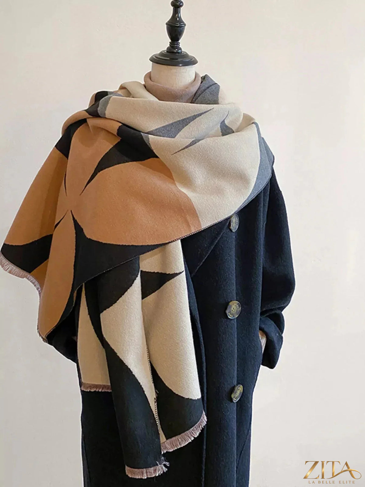 Contrast raw hem scarf by Trendsi featuring soft fabric, fringe edges, and a stylish, casual design in neutral tones.