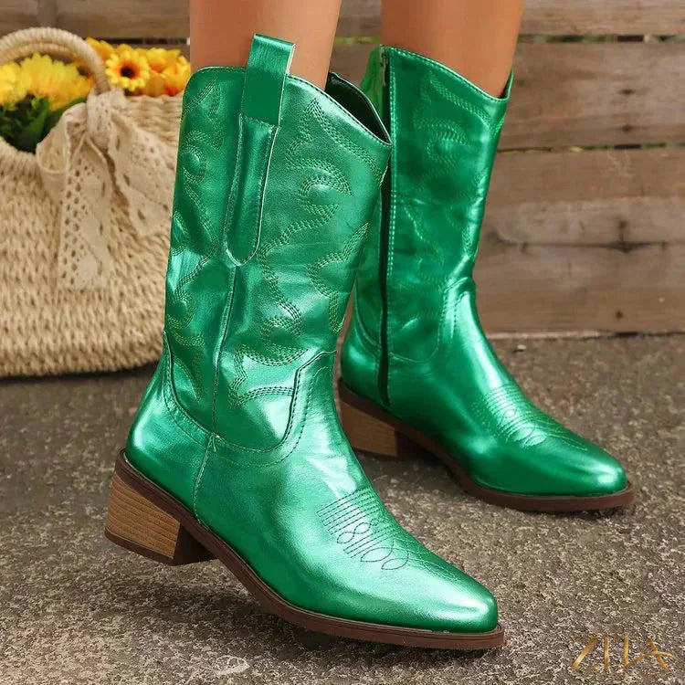 Embroidered Western cowboy boots with intricate floral designs and pointed toes, crafted by Trendsi.
