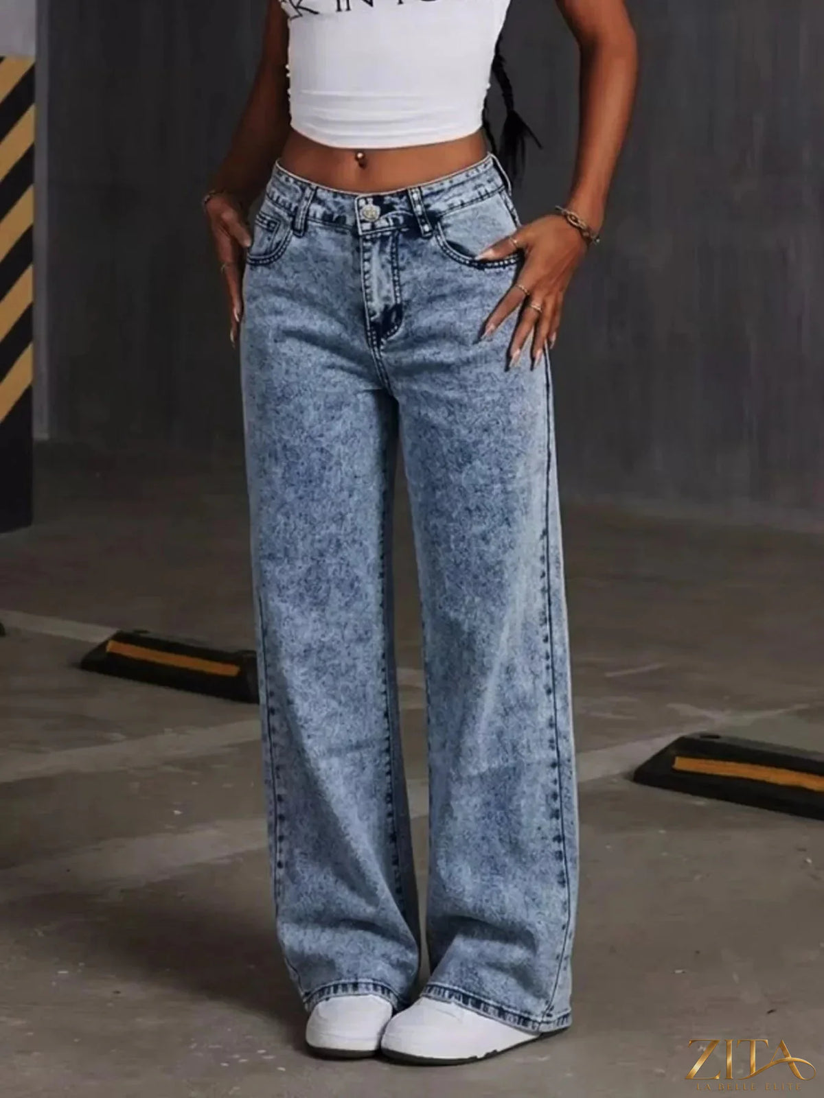 Washed wide-leg jeans by Zita La Belle Elite featuring embroidered bow detail on the front, casual and stylish denim pants.