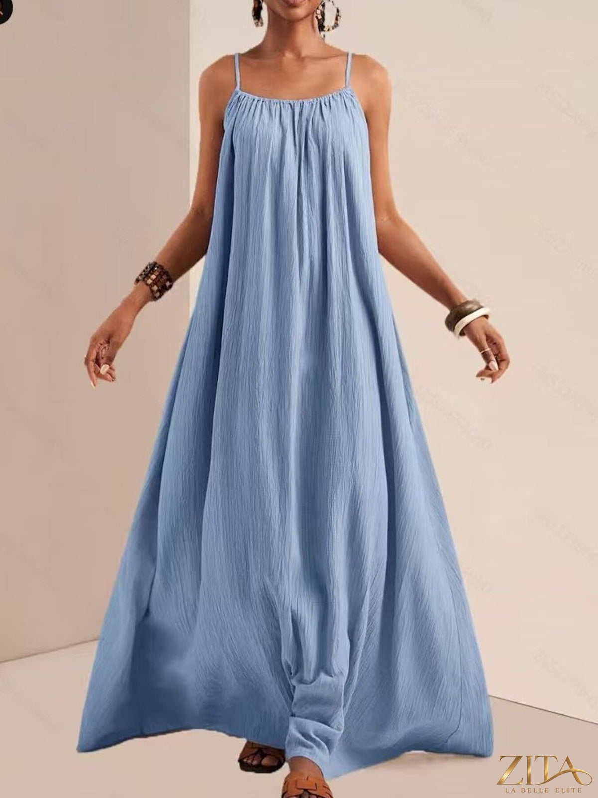 Flowy spaghetti strap maxi dress by Zita La Belle Elite, featuring lightweight fabric and a relaxed, elegant fit.