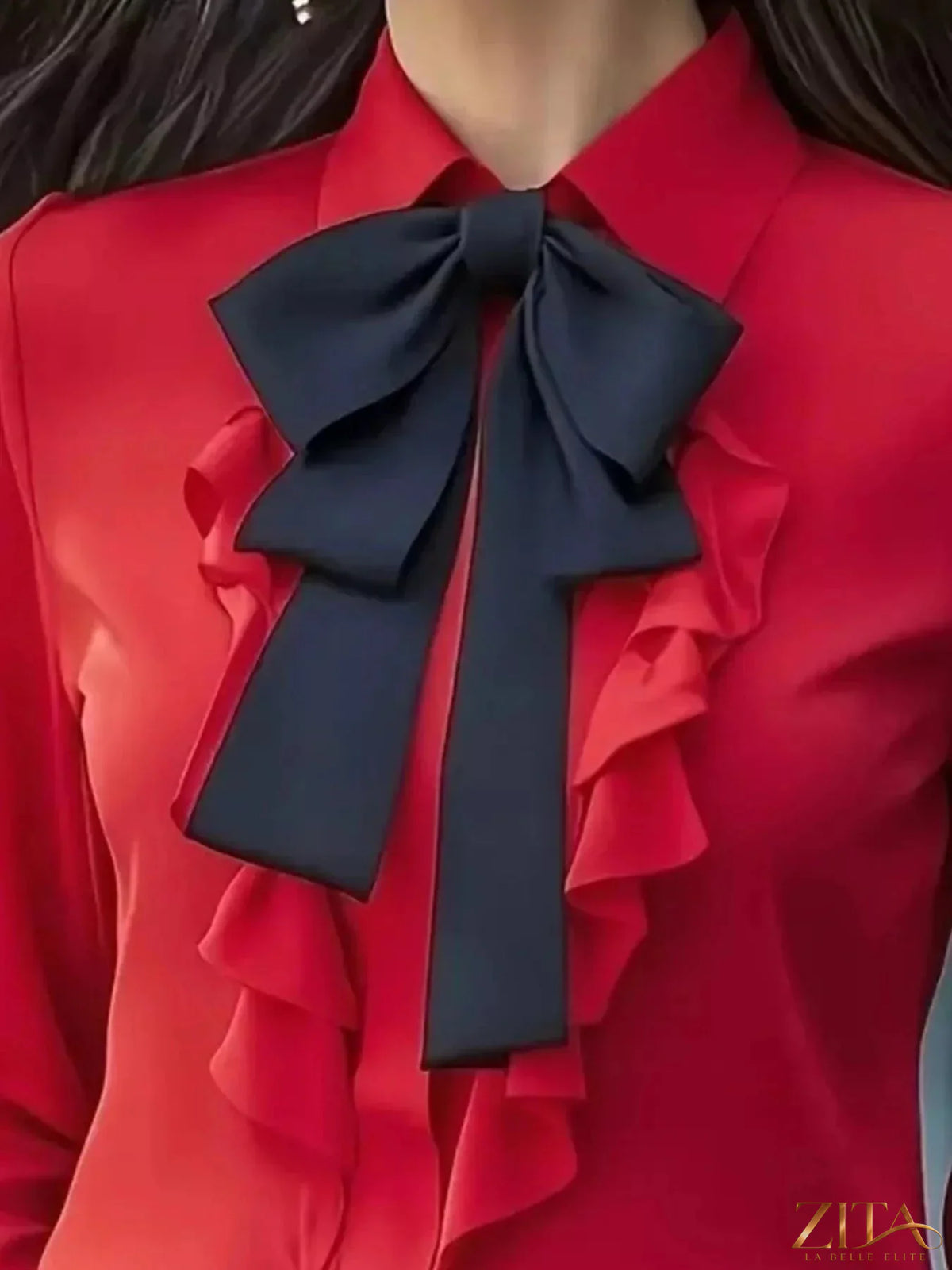 Zita La Belle Elite ruffled tie-front long sleeve blouse with feminine design and elegant details, showcased on a white background.