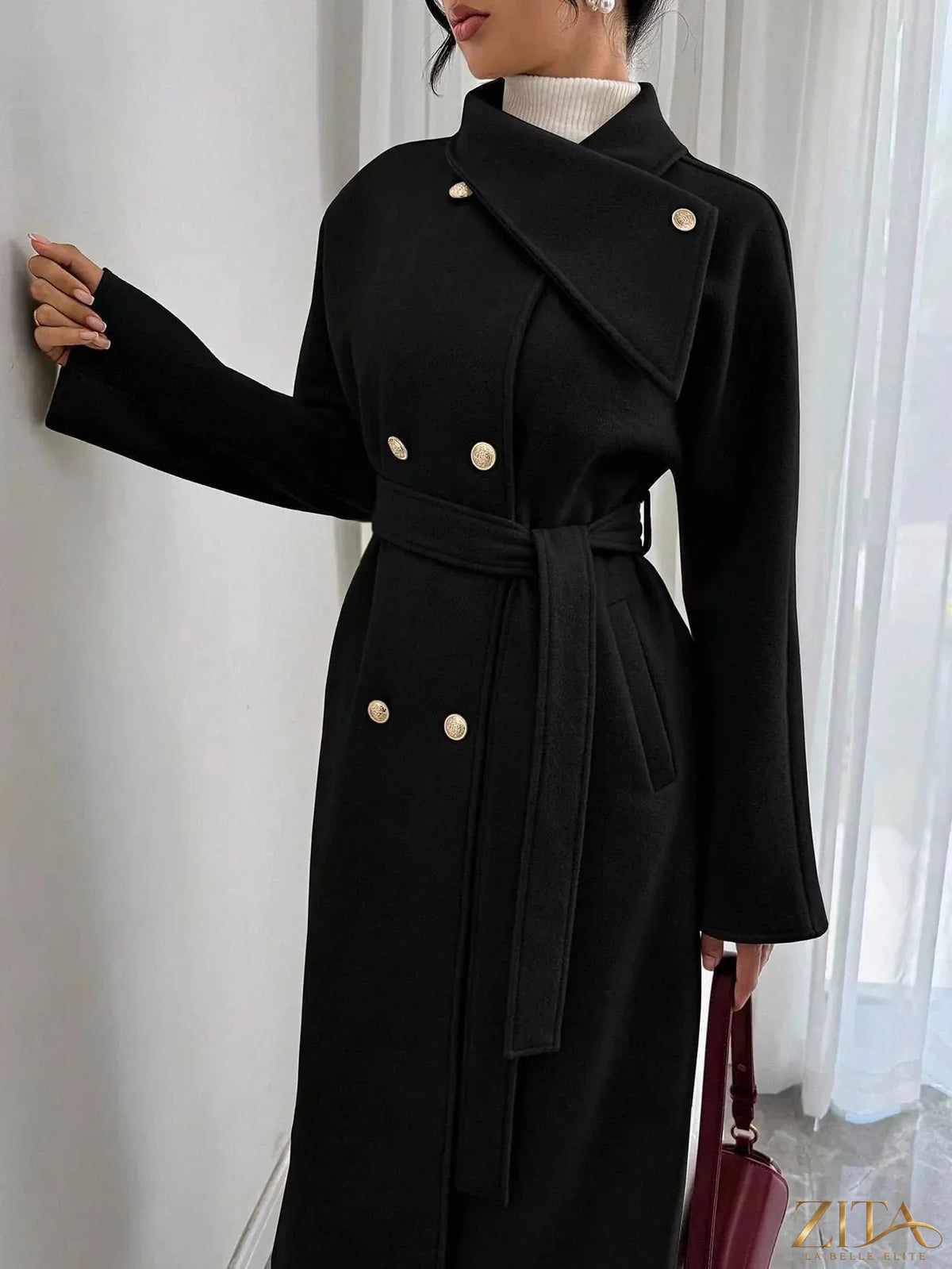 Zita La Belle Elite double-breasted longline coat in neutral fabric, featuring a tailored fit and classic lapel collar.