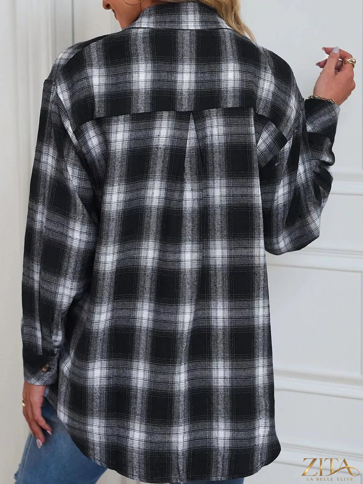 Zita La Belle Elite plaid button-down oversized shirt with classic checkered pattern and relaxed fit, displayed on a hanger.