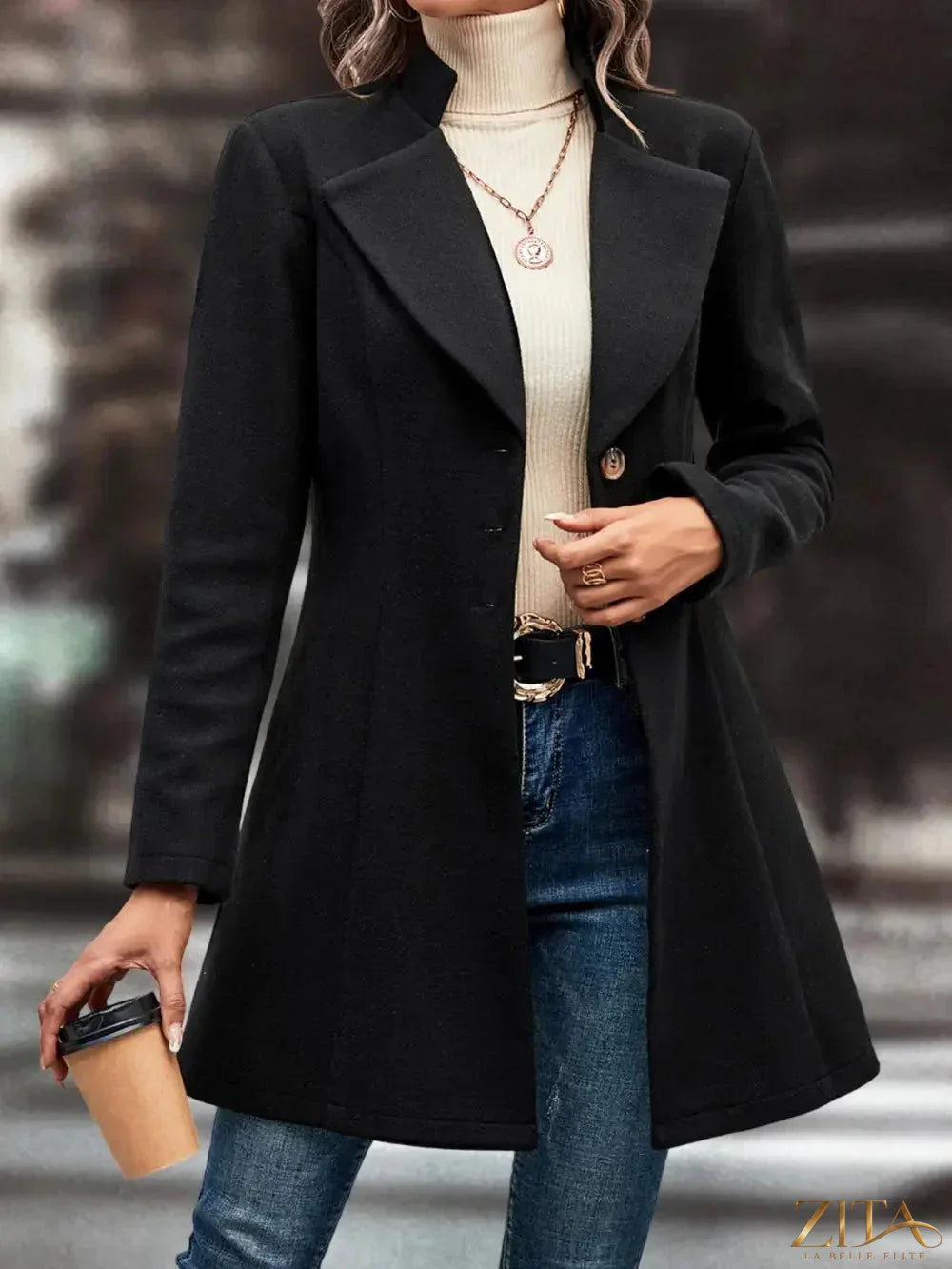 Zita La Belle Elite button-up longline coat in neutral fabric, featuring a tailored fit and classic collar design.
