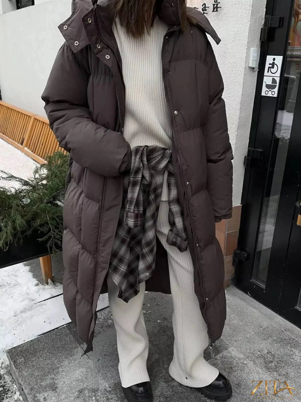 Longline padded winter coat with belt from Zita La Belle Elite, featuring a warm, insulated design and stylish belt detail.