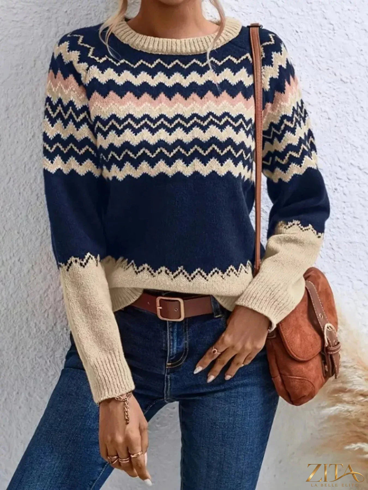 Geometric pattern knitted sweater by Trendsi featuring a colorful, intricate knit design and long sleeves on a neutral background.