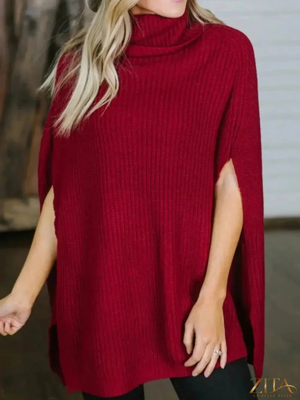 Zita La Belle Elite turtleneck slit sweater featuring a fitted design and stylish slit detail on the sleeves.