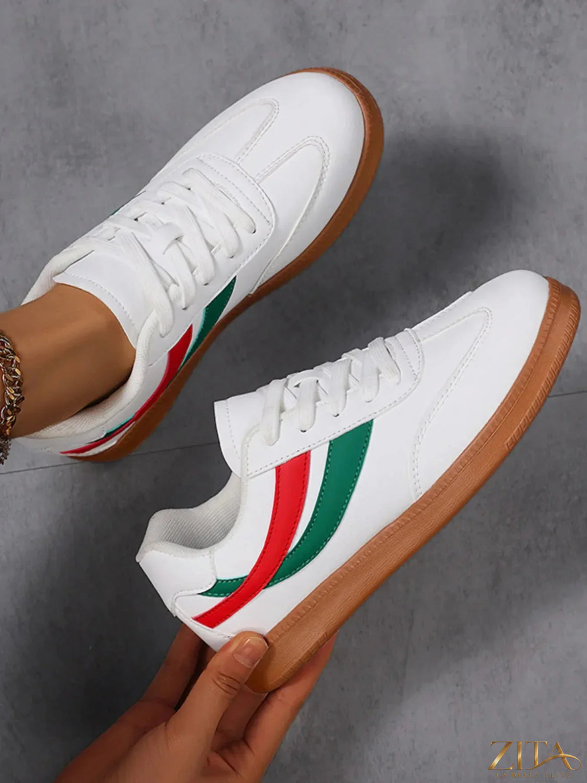 Zita La Belle Elite lace-up flat sneakers with stripe accent, showcasing white material and stylish design on a neutral background.