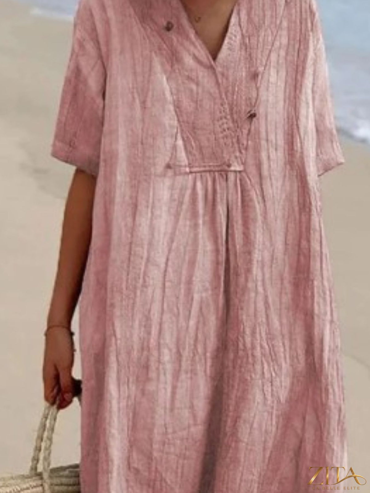 Casual loose short sleeve midi dress by Zita La Belle Elite, featuring a relaxed fit and simple design in a lightweight fabric.