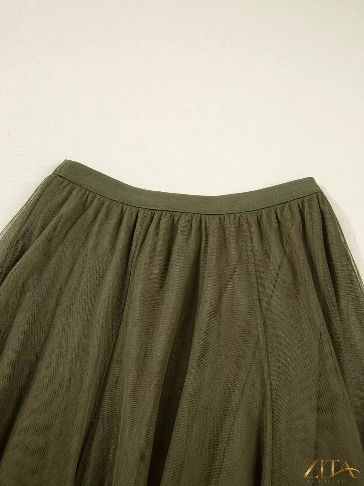 Light pink Tulle A-Line Midi Skirt by Trendsi featuring a flowy, layered design perfect for elegant, feminine outfits.