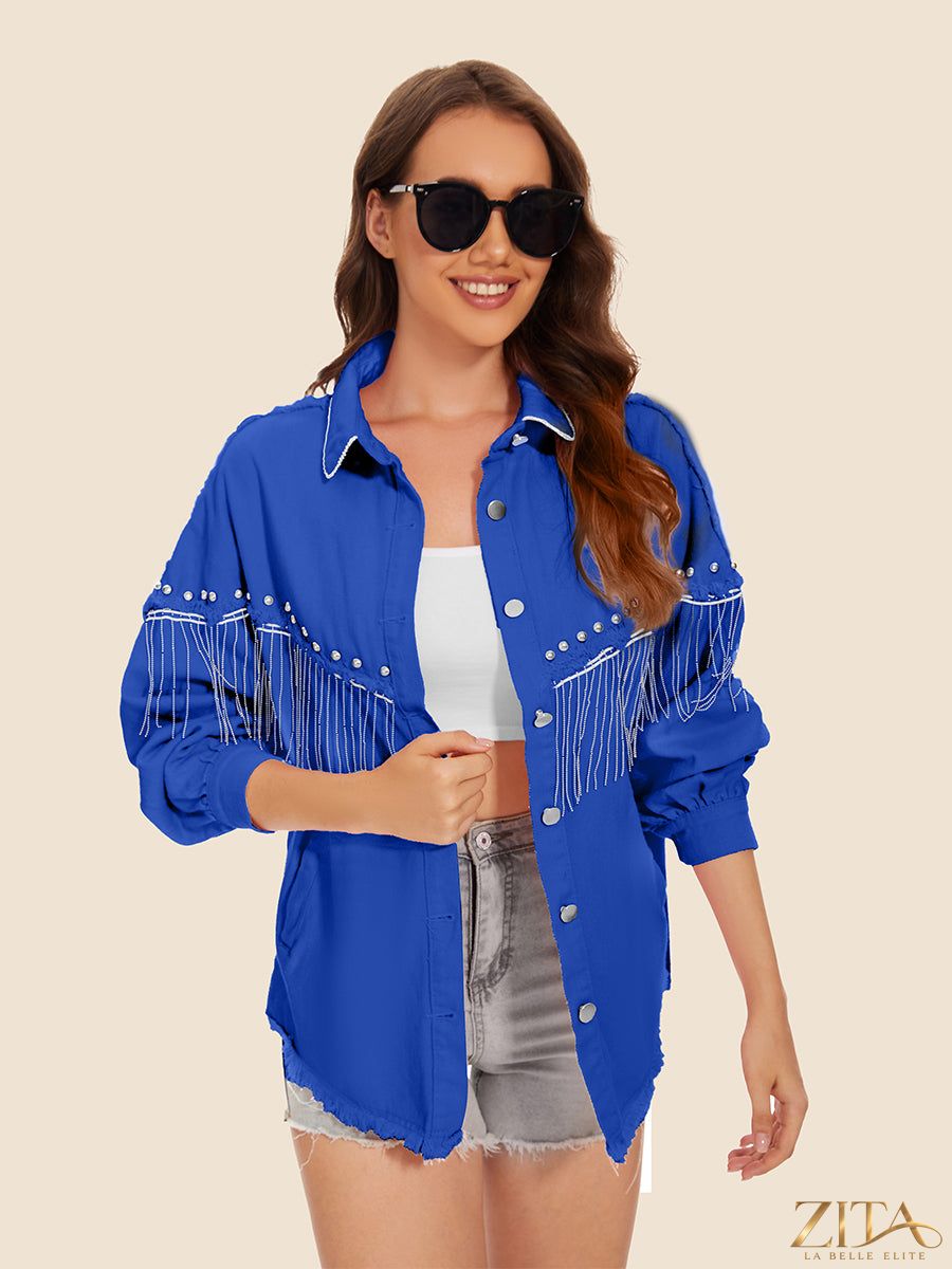 Raw hem fringe detail denim jacket by Zita La Belle Elite featuring distressed denim and fringe accents on the sleeves.