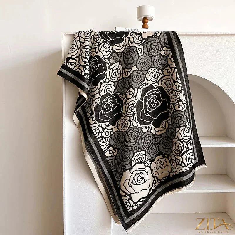 Zita La Belle Elite rose pattern raw hem scarf displayed flat with floral design and fringed edges on a neutral background.