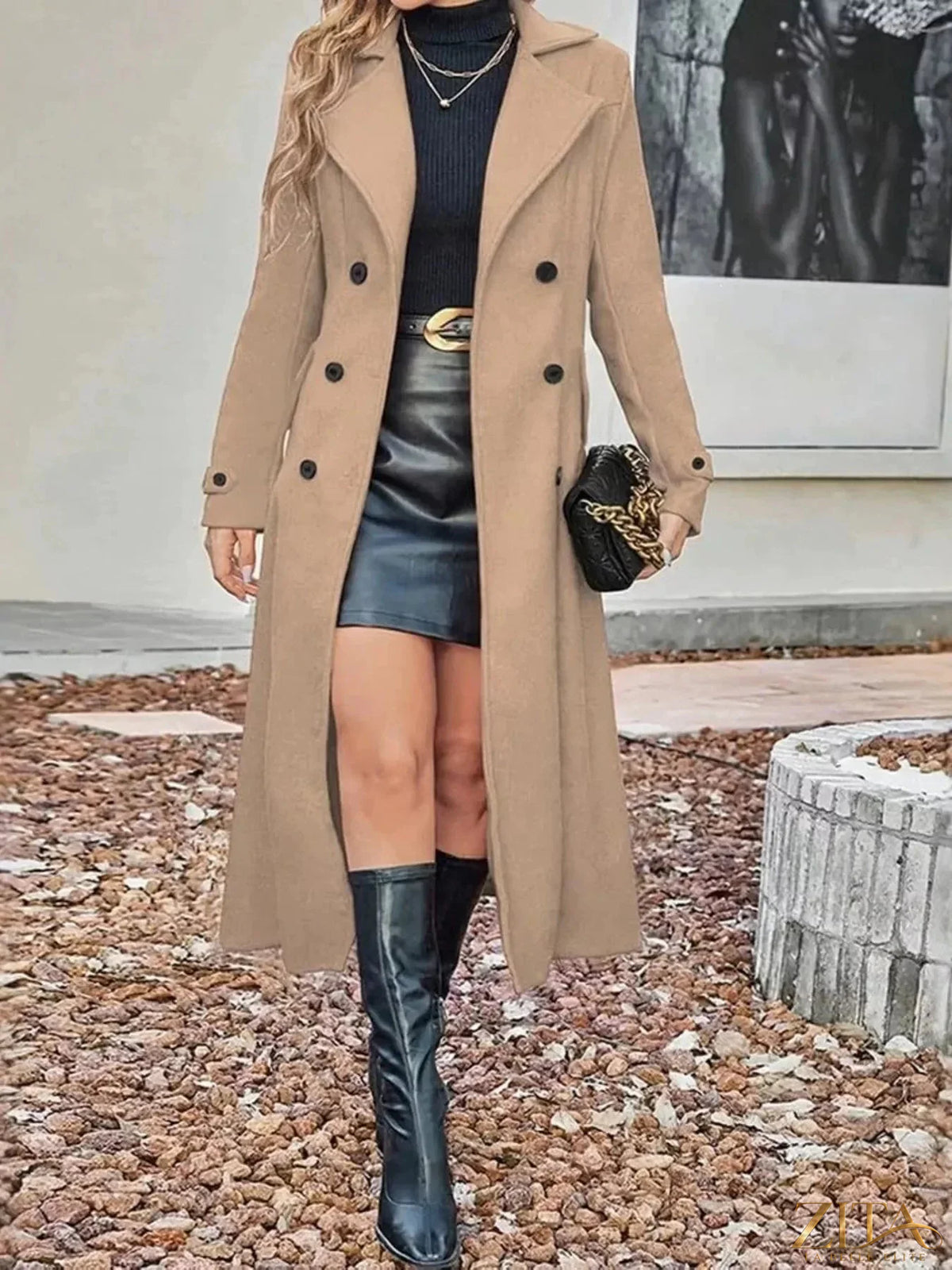 Plus size Zita La Belle Elite longline double-breasted trench coat with a full-length design and classic style, shown in neutral color.