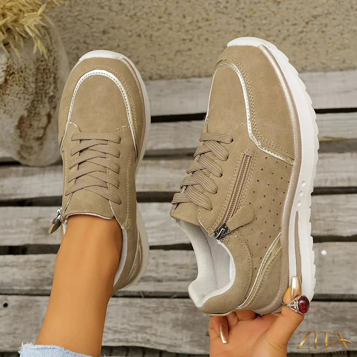 Zita La Belle Elite round toe lace-up sneakers with white and black design, featuring sturdy rubber soles and stylish casual fit.