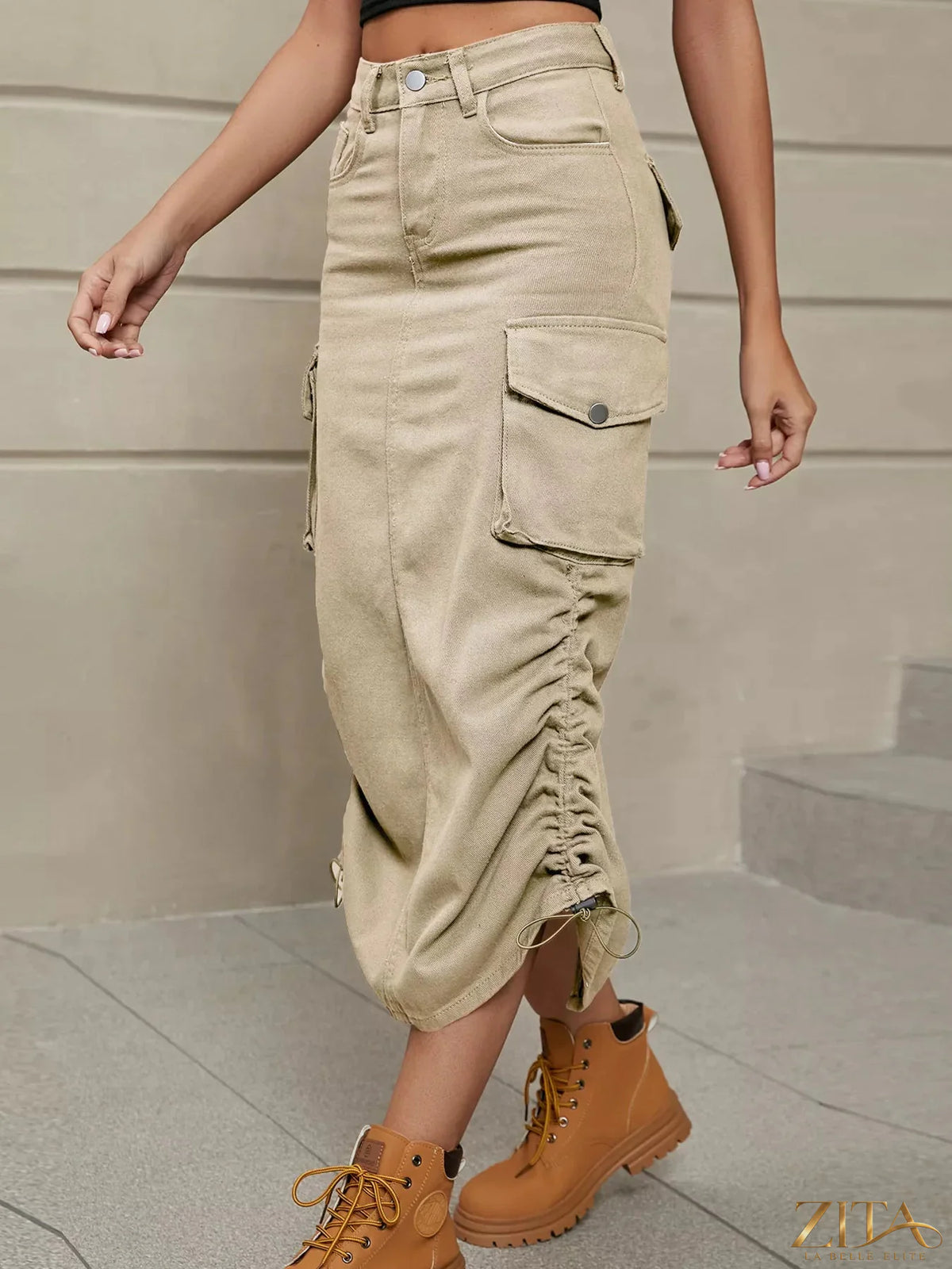 Gray ruched cargo midi skirt from Trendsi featuring side pockets and a high-waisted design.