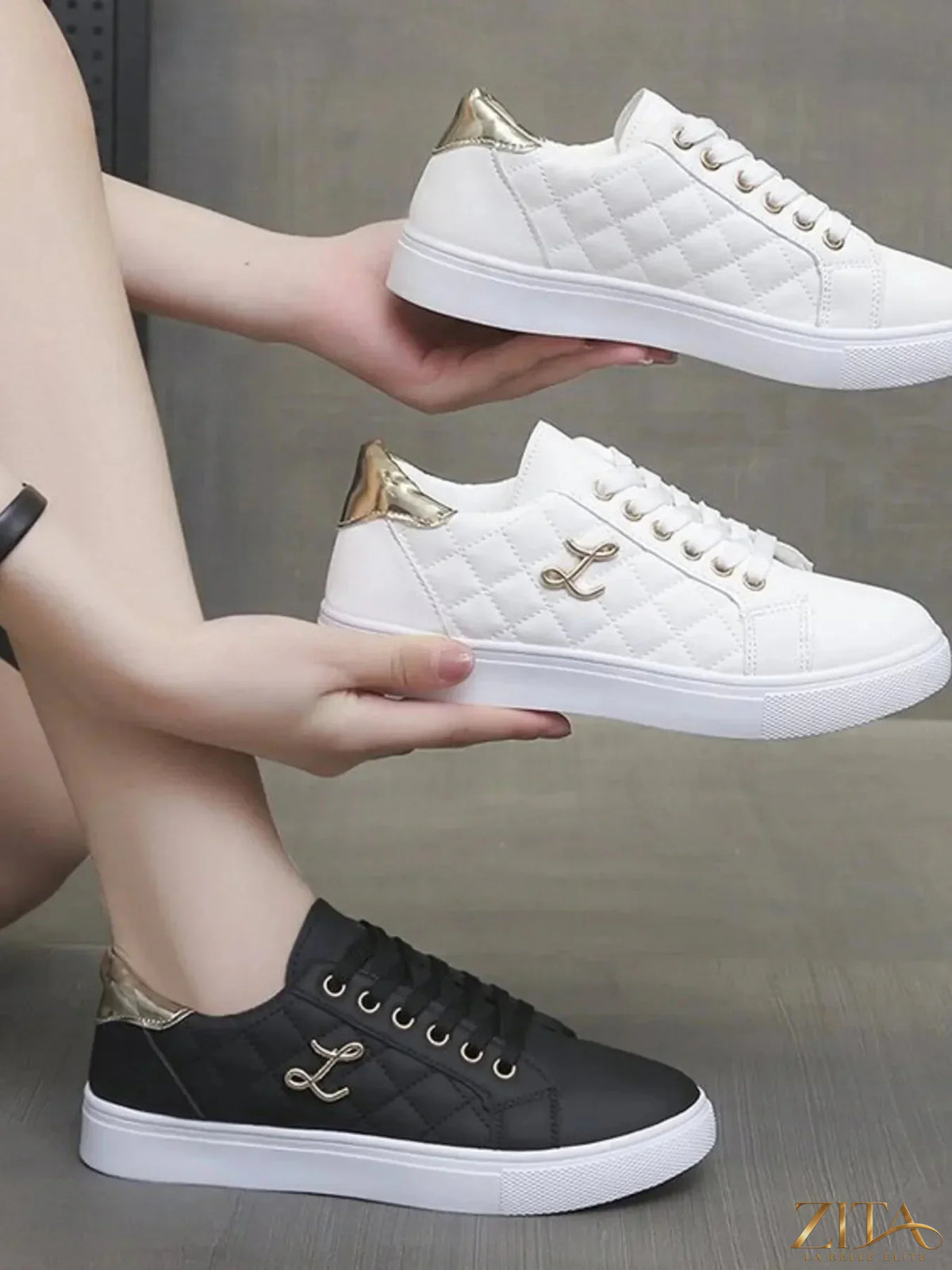 Zita La Belle Elite quilted platform sneakers with metallic gold accents, showcasing stylish footwear with textured quilting and shiny details.