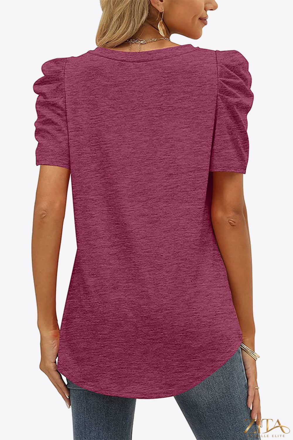 V-neck puff sleeve tee by Trendsi featuring a fitted silhouette, soft fabric, and stylish puffed sleeves for a trendy look.
