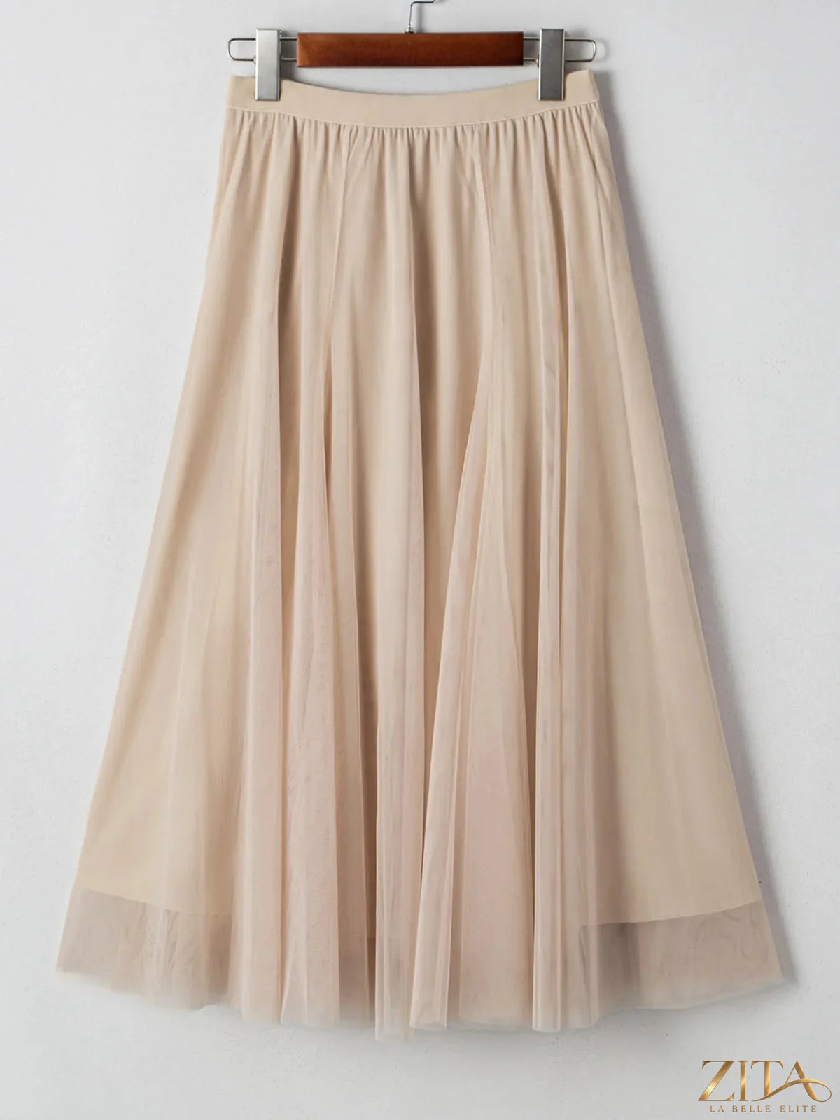 High-waisted midi skirt by Trendsi featuring a flowy fabric and elegant design, perfect for stylish everyday wear.