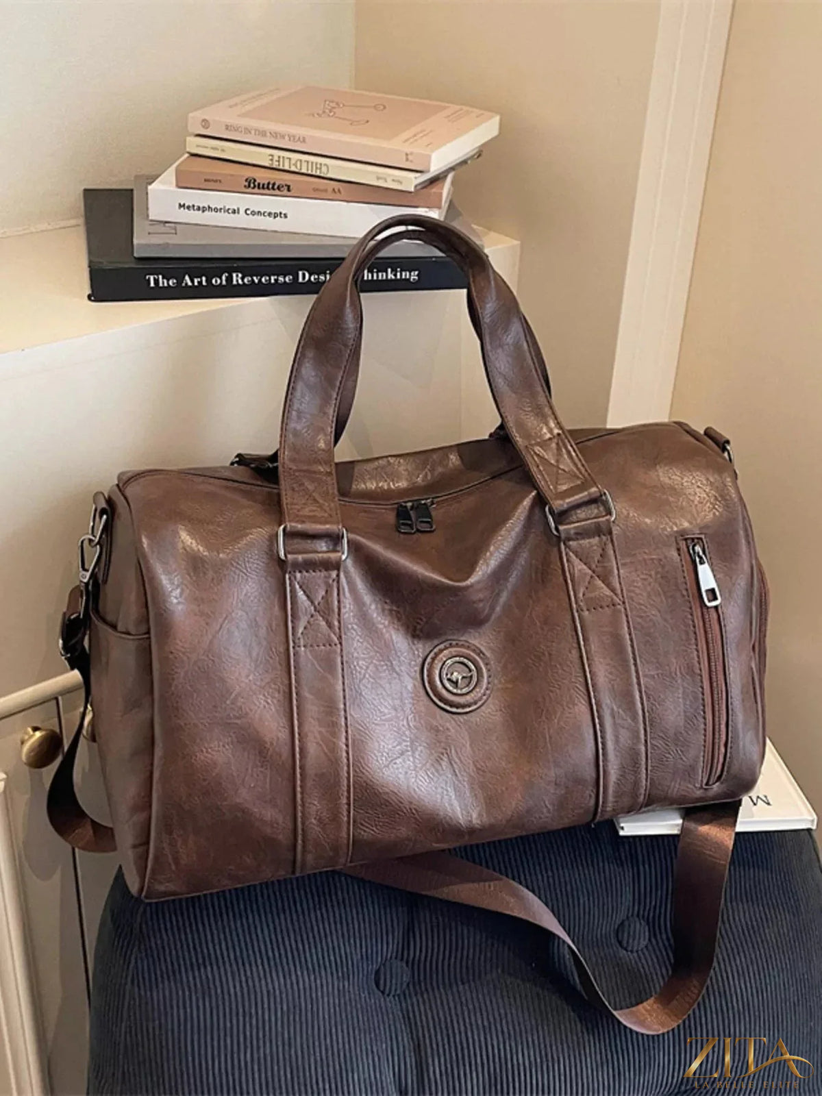 Trendsi PU leather duffel bag with sturdy handles and spacious interior, ideal for travel or gym use.