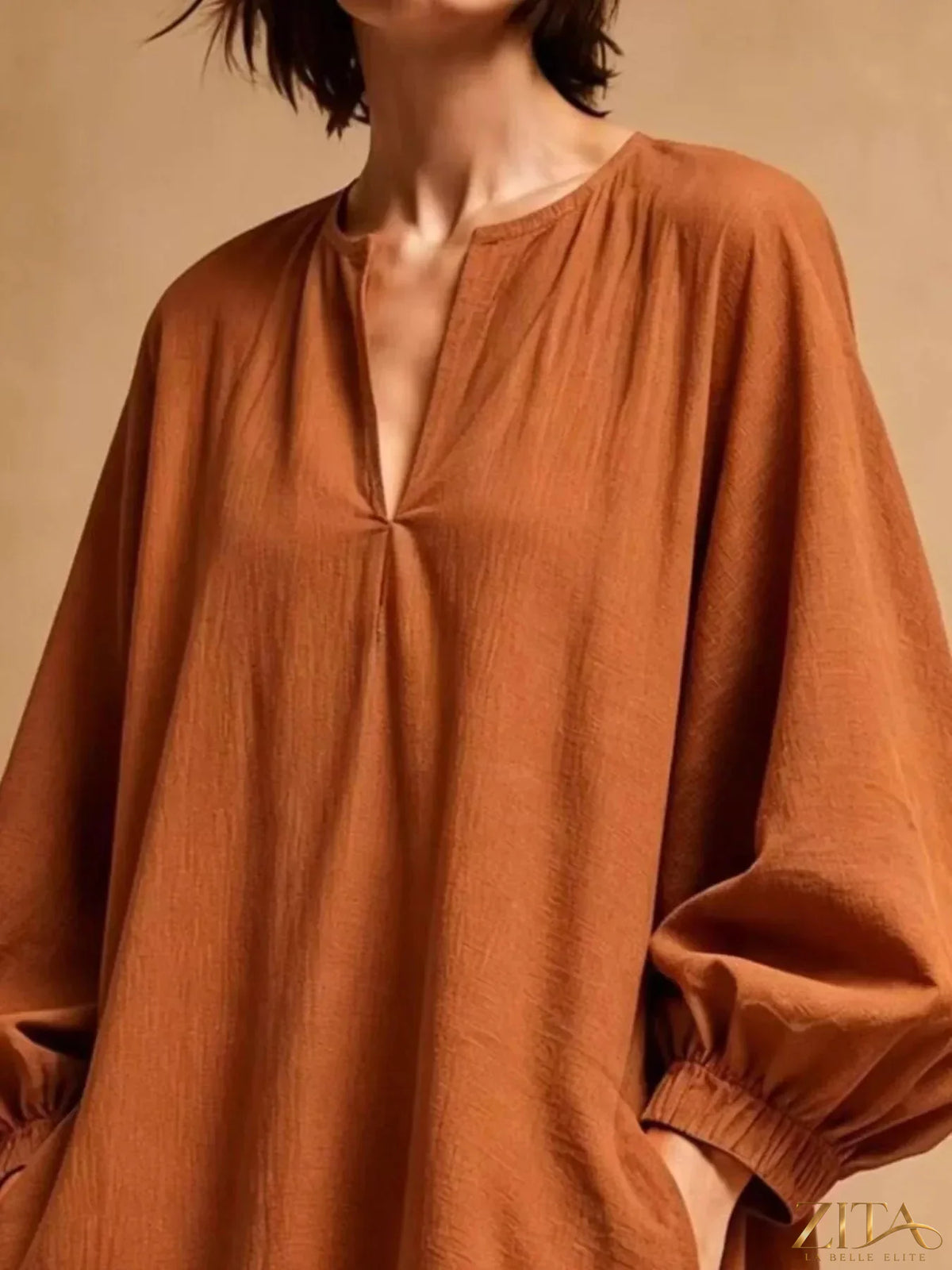 Zita La Belle Elite casual loose-fit mini dress with balloon sleeves and pockets, shown in a relaxed, stylish fit.