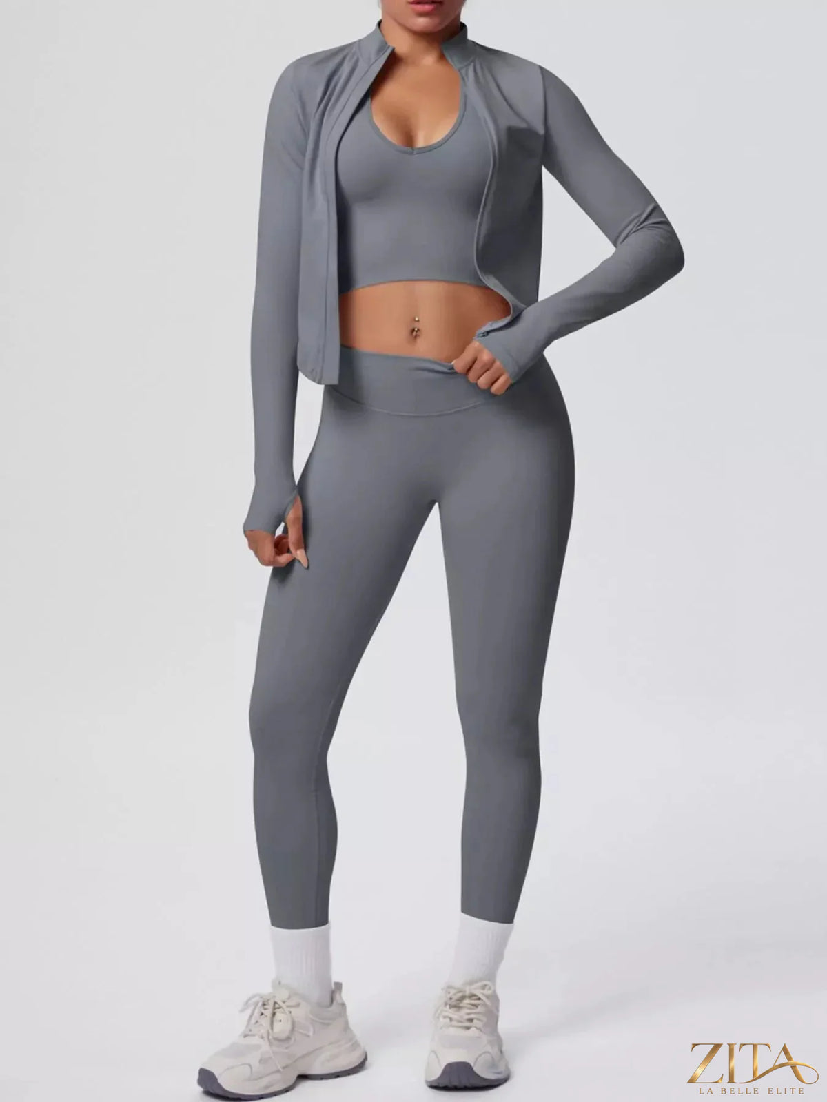 Zita La Belle Elite three-piece active set with tank top, zip-up jacket, and leggings in sleek athletic style.