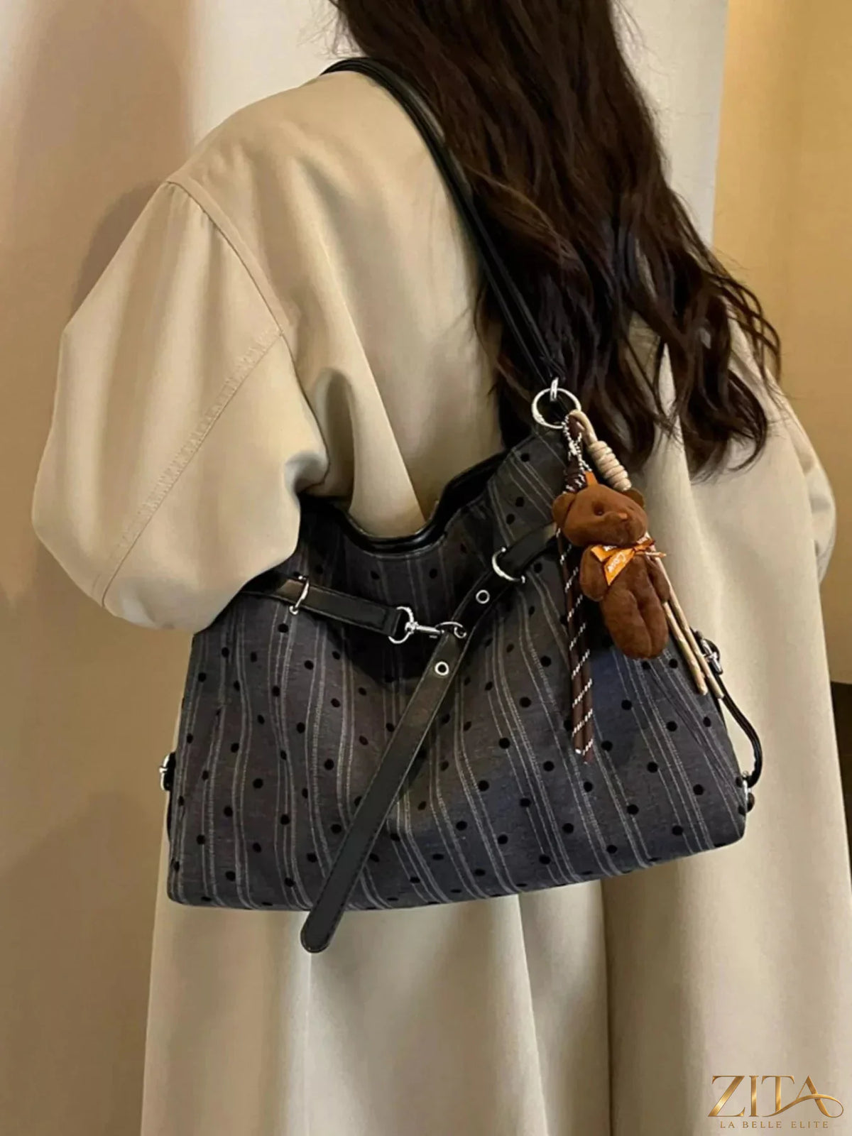 Zita La Belle Elite polka dot shoulder bag with adjustable strap and zipper closure, stylish accessory for everyday use.