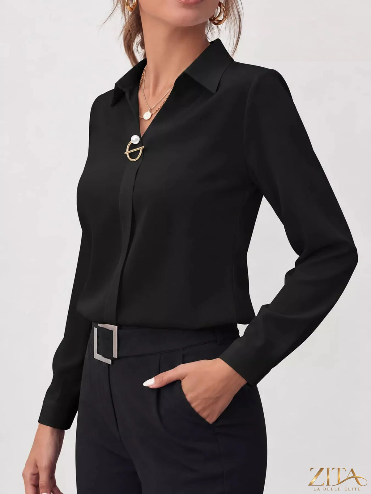 Zita La Belle Elite long sleeve satin blouse featuring a smooth, shiny fabric and a classic fit, displayed on a hanger.