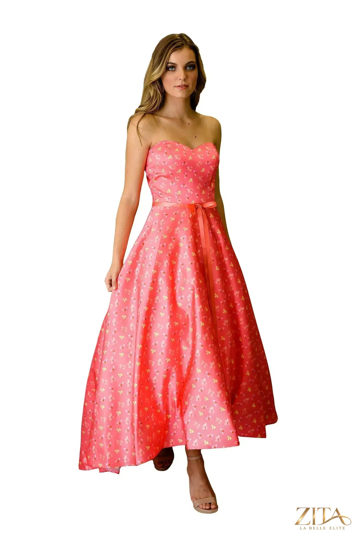 Elegant shoulder-less formal train dress by Zita La Belle Elite, featuring a flowing silhouette and intricate detailing for special occasions.