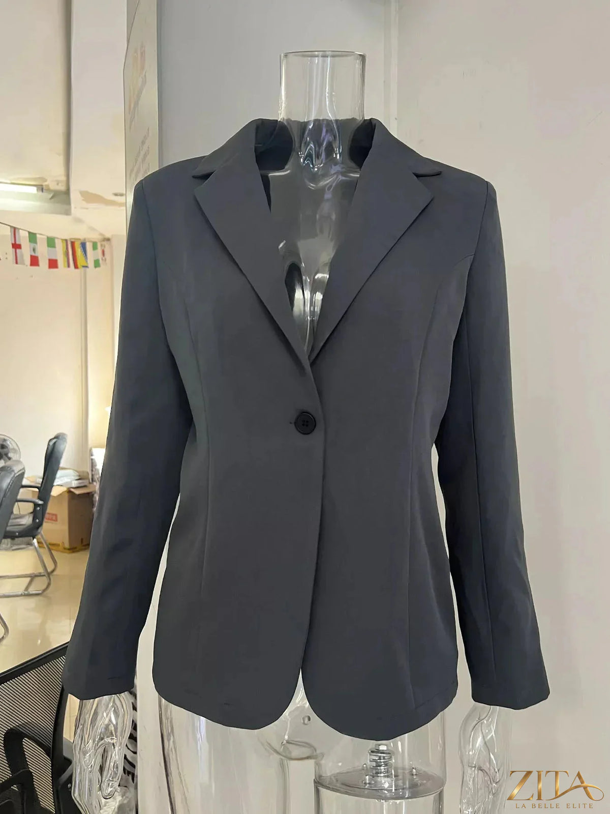 Slim-fit single-button casual blazer by Trendsi, shown in navy with tailored lapels and sleek design for a modern look.