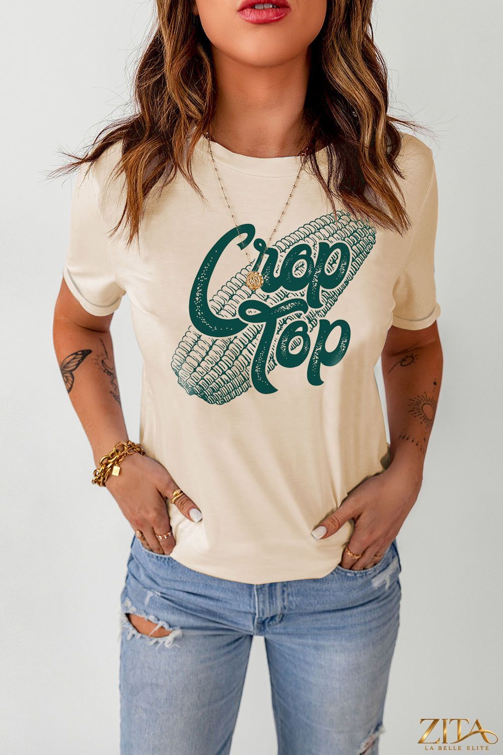 Corn Letter Graphic Cuffed T-Shirt by Trendsi featuring a colorful corn design and rolled cuffs, casual and trendy apparel.