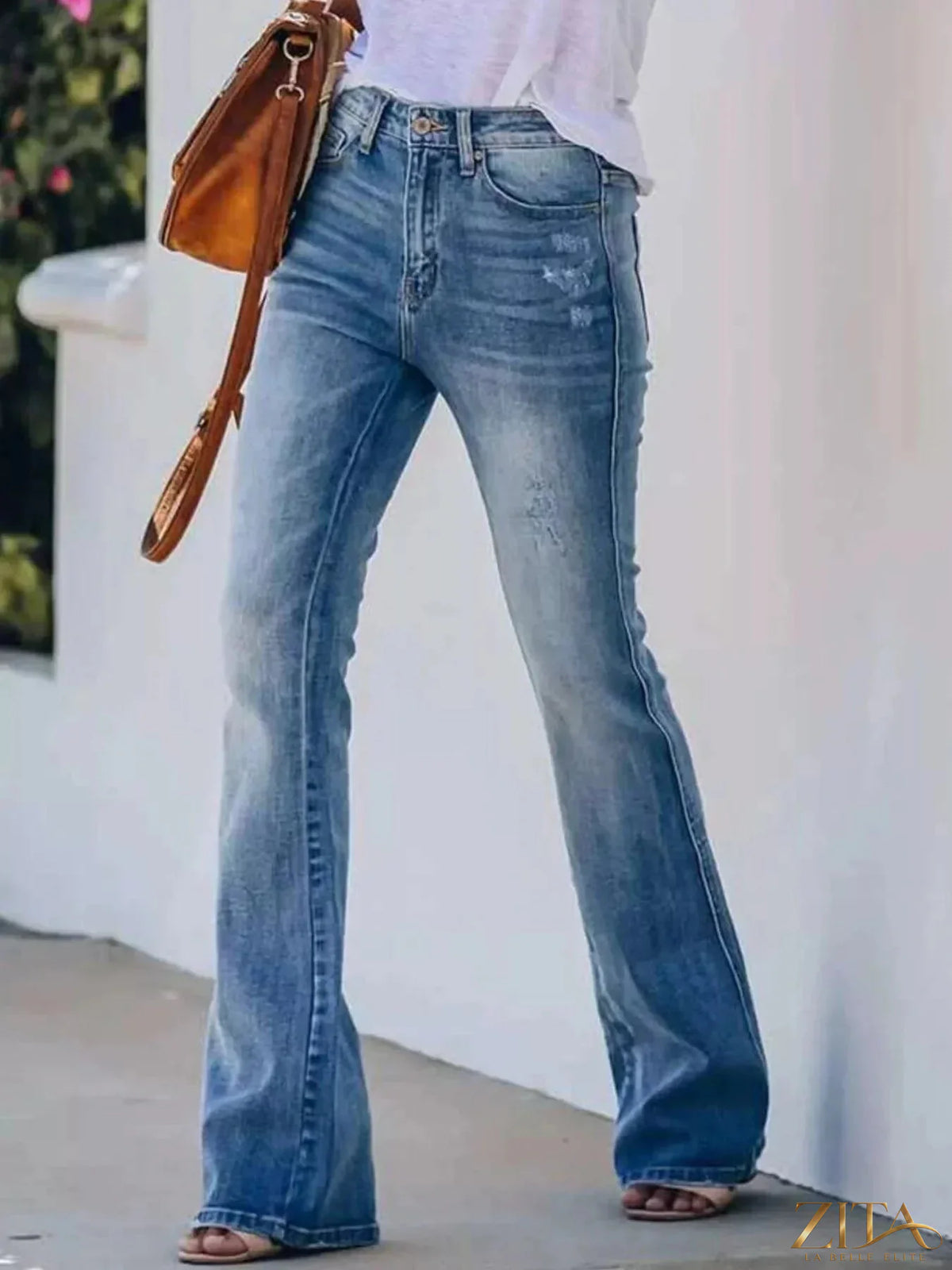 Zita La Belle Elite high-waisted flare jeans with fitted waist and wide leg opening, denim fabric, and classic blue wash.