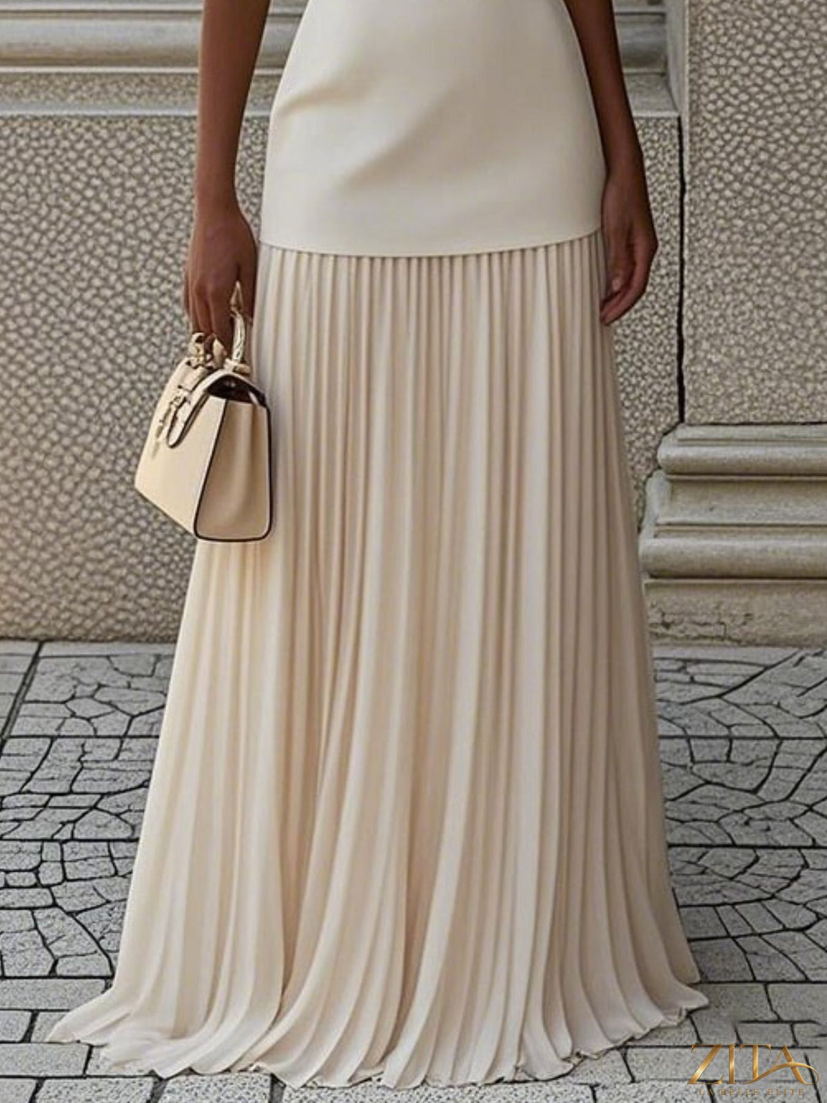 Plus size sleeveless top and pleated maxi skirt set by Zita La Belle Elite, featuring a stylish, coordinated ensemble.