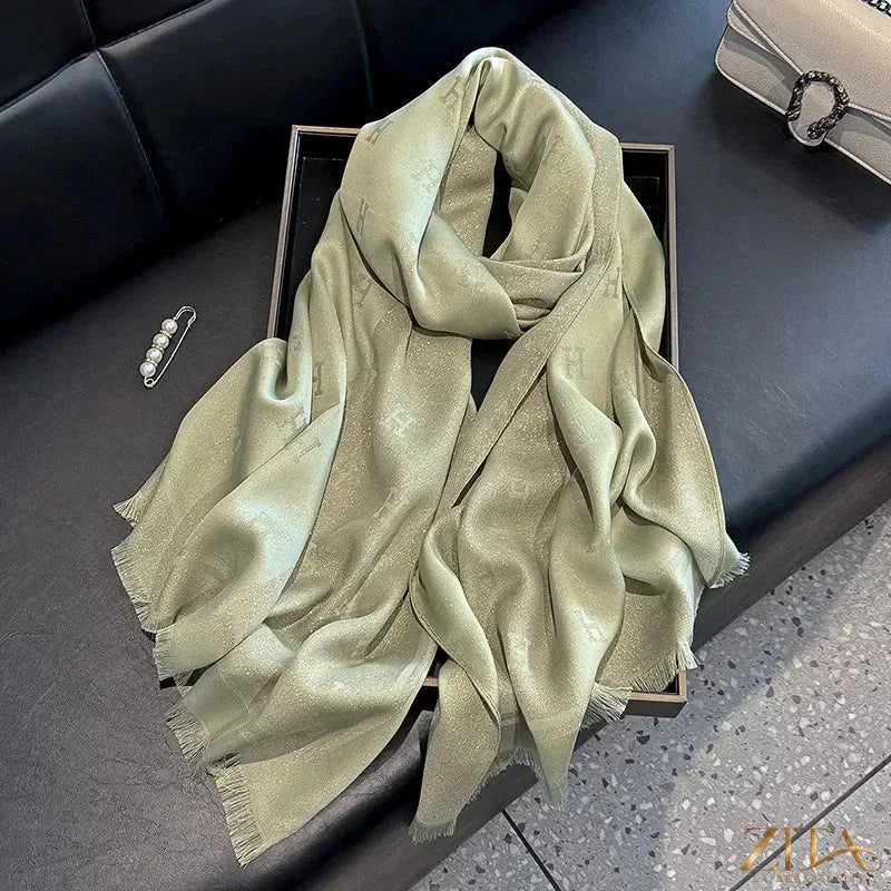 Raw hem scarf by Trendsi featuring soft, lightweight fabric with frayed edges, styled loosely draped on a neutral background.